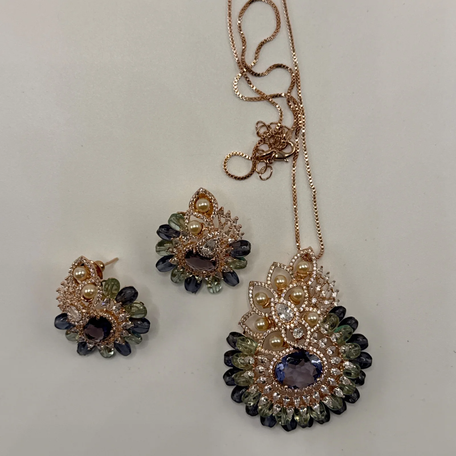 Designer inspired pendant set purple and mint combination. from Desi Girl Gems